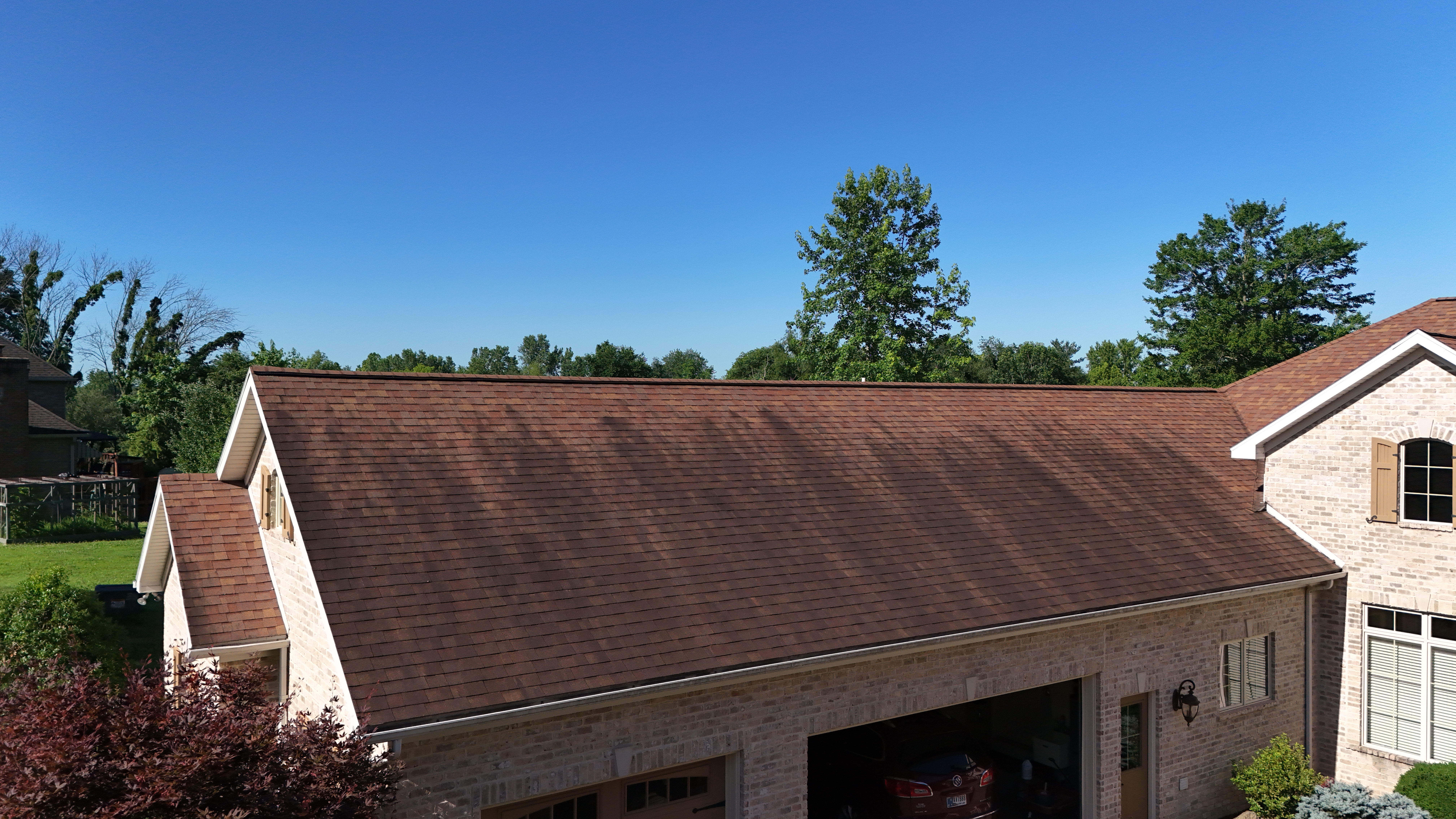 Roof before soft wash — algae and black streaks